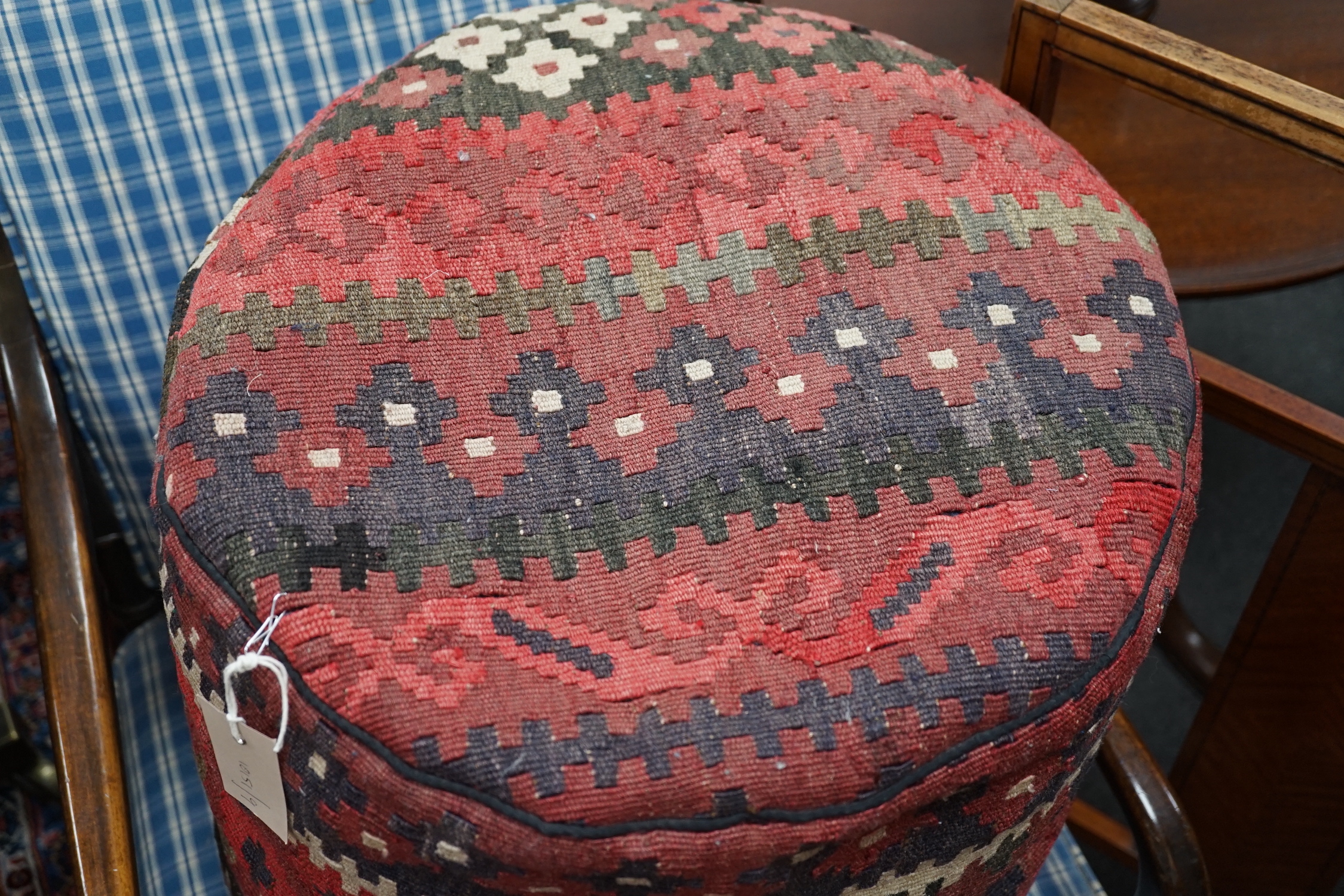 A circular kilim pouffe, diameter 45cm, height 40cm